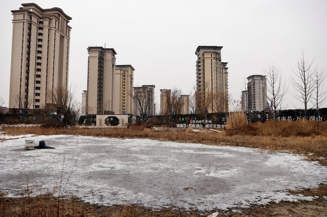 File Photo: A view of an unfinished residential compound developed by China Evergrande Group in the outskirts of Shijiazhuang, Hebei province, China February 1, 2024. REUTERS/Tingshu Wang/File Photo
