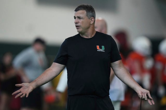 Miami head coach Mario Cristobal watches as players do drills during NCAA college football practice, Monday, Aug. 4, 2025, in Coral Gables, Fla. (AP Photo/Lynne Sladky)