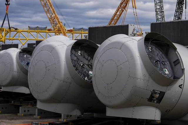 FILE - Wind turbine components sit at New London State Pier, April 16, 2025, in New London, Conn. (AP Photo/Julia Demaree Nikhinson, File)