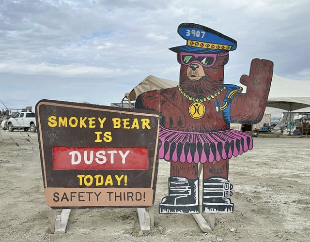 Fierce dust storms destroyed many campsites the evening before Burning Man was set to officially begin in the Black Rock Desert on Aug. 23, 2025. The entrance gates reopened Monday morning after storms shut down the festival’s main access point over the weekend. But thousands of attendees faced wait times of six to eight hours on the road into the desert, according to organizers.