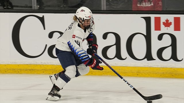 Nov 21, 2021; Kingston, Ontario, CAN; USA forward Brianna Decker (14) shoots the puck during the warm up of a Rivalry Series women's hockey game against Canada at Leon's Centre. Mandatory Credit: John E. Sokolowski-Imagn Images