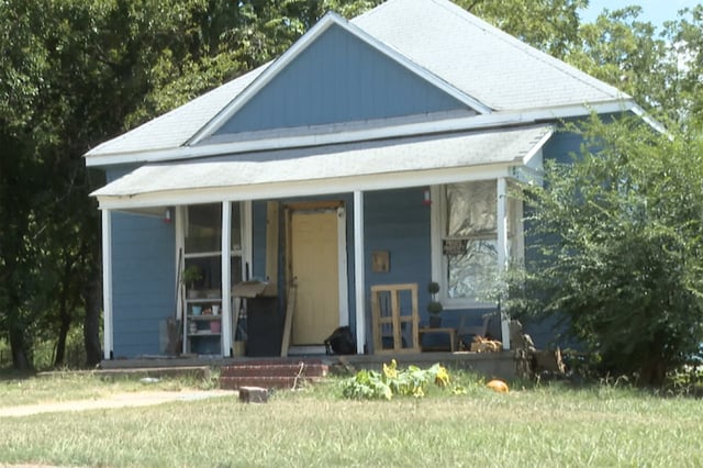 The house in Muskogee, Okla., where the 11-year-old lived where children were exposed to unstable and unsanitary conditions.