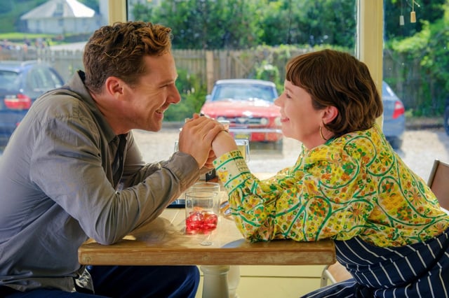 Benedict Cumberbatch and Olivia Colman portray a couple that isn’t always this happy in “The Roses.” (Courtesy of Searchlight Pictures)