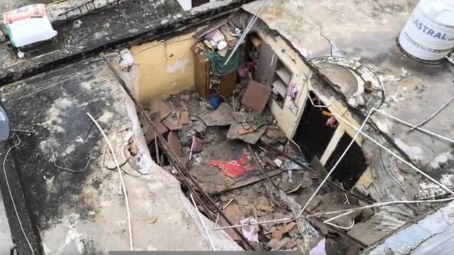 The broken roof and debris seen at the site of the roof collapse in west Delhi’s Dwarka on Monday. (HT photo)