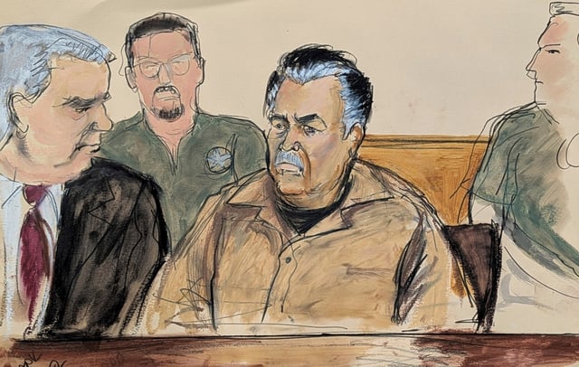 In this courtroom sketch, Ismael "El Mayo" Zambada Garcia, center, is seated beside his defense attorney Frank Perez, left, in Federal court, in the Brooklyn borough of New York, Friday, Sept. 13, 2024. (Elizabeth Williams via AP)