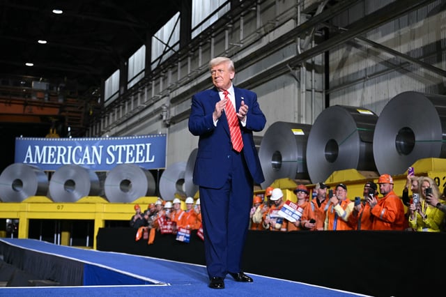President Donald Trump applauds as he arrives to speak during a visit to US Steel - Irvin Works in West Mifflin, Pennsylvania on May 30.