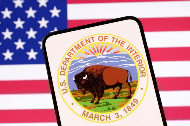 United States Department of the Interior logo and U.S. flag are seen in this illustration taken April 23, 2025. REUTERS/Dado Ruvic/Illustration/File Photo