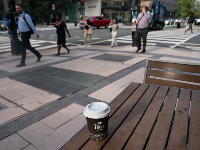 A cup of coffee in an arranged photo outside a Peet's Coffee & Tea store in Washington, DC, US, on Monday, Aug. 25, 2025. Keurig Dr Pepper Inc. agreed to buy JDE Peet’s NV for €15.7 billion ($18.4 billion) to bolster its struggling coffee business before kicking off a split of its operations. Photographer: Stefani Reynolds/Bloomberg