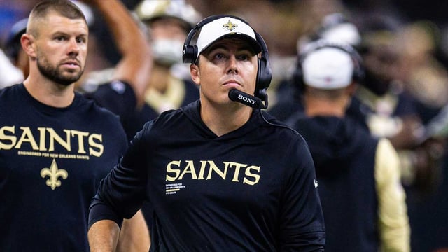 Aug 23, 2025; New Orleans, Louisiana, USA; New Orleans Saints head coach Kellen Moore looks on against the Denver Broncos during the first half at Caesars Superdome. Mandatory Credit: Stephen Lew-Imagn Images