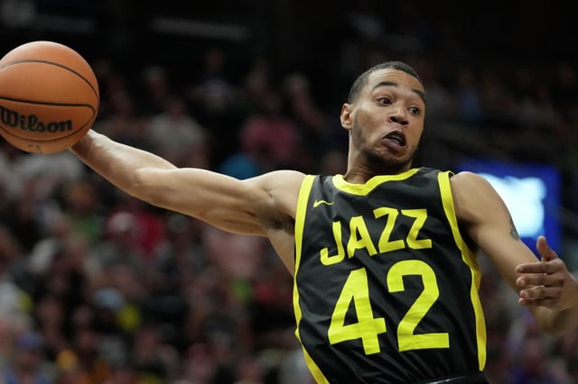 Utah Jazz guard Taevion Kinsey (42) pulls down a round in the second half during an NBA Summer League basketball game against the Oklahoma City Thunder Monday, July 3, 2023, in Salt Lake City.