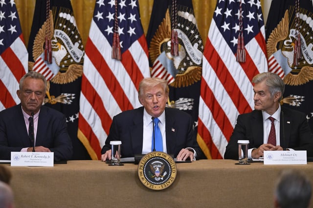 President Donald Trump speaks at an event to promote his proposal to improve Americans' access to their medical records, in the East Room of the White House, Wednesday, July 30, 2025, in Washington, as Health and Human Service Secretary Robert F. Kennedy, Jr., left, and Administrator of the Centers for Medicare and Medicaid Services, Mehmet Oz, right, look on.