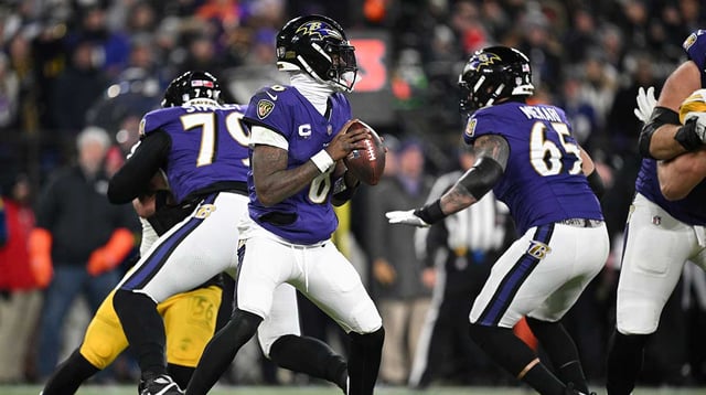 Jan 11, 2025; Baltimore, Maryland, USA; Baltimore Ravens quarterback Lamar Jackson (8) looks to pass in the second quarter against the Pittsburgh Steelers in an AFC wild card game at M&T Bank Stadium. Mandatory Credit: Tommy Gilligan-Imagn Images