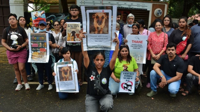 MUMBAI, INDIA - AUGUST 23: Dog lovers and NGO in Thane protested at Upavan lake demanding that the Supreme Court's decision in Delhi is invalid and that the dog should be treated with compassion and not sent to a shelter, on August 23, 2025 in Mumbai, India. 