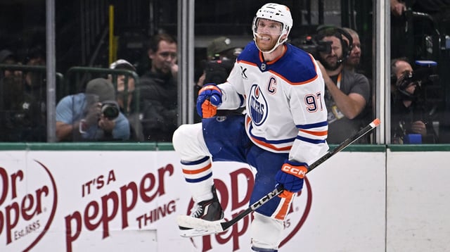 May 29, 2025; Dallas, Texas, USA; Edmonton Oilers center Connor McDavid (97) reacts after scoring a goal against the Dallas Stars during the second period in game five of the Western Conference Final of the 2025 Stanley Cup Playoffs at American Airlines Center. Mandatory Credit: Jerome Miron-Imagn Images
