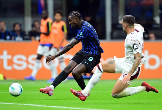 Soccer Football - Serie A - Inter Milan v Torino - San Siro, Milan, Italy - August 25, 2025 Inter Milan's Marcus Thuram scores their second goal REUTERS/Daniele Mascolo
