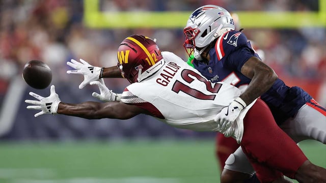 Aug 8, 2025; Foxborough, Massachusetts, USA; New England Patriots cornerback Miles Battle (35) breaks up a pass to Washington Commanders receiver Michael Gallup (12) during the first half at Gillette Stadium. Mandatory Credit: Paul Rutherford-Imagn Images