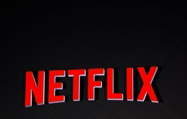 The logo of Netflix the American provider of on-demand Internet streaming media is seen during a photocall in Paris, France, April 29, 2025. REUTERS/Gonzalo Fuentes/File Photo