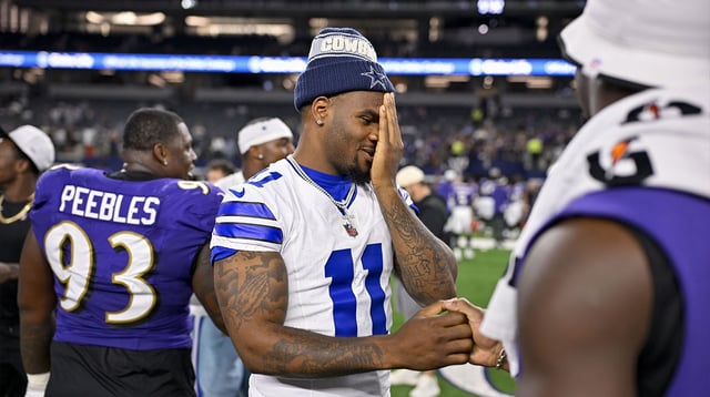 Aug 16, 2025; Arlington, Texas, USA; Dallas Cowboys defensive end Micah Parsons (11) talks with Baltimore Ravens linebacker Odafe Oweh (99) after the game at AT&T Stadium. Mandatory Credit: Jerome Miron-Imagn Images