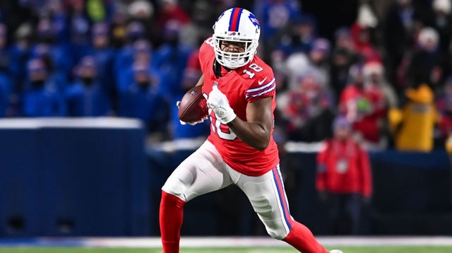 Bills wide receiver Amari Cooper (18) turns up field after making a catch in the second quarter against the New England Patriots at Highmark Stadium