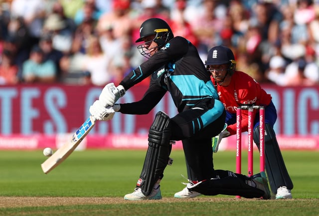 Cricket - IT20 International - England v New Zealand - Edgbaston Cricket Ground, Birmingham, Britain - September 3, 2023 New Zealand's Finn Allen in action as he hits a six off the bowling of England's Adil Rashid Action Images via Reuters/Andrew Boyers/File Photo