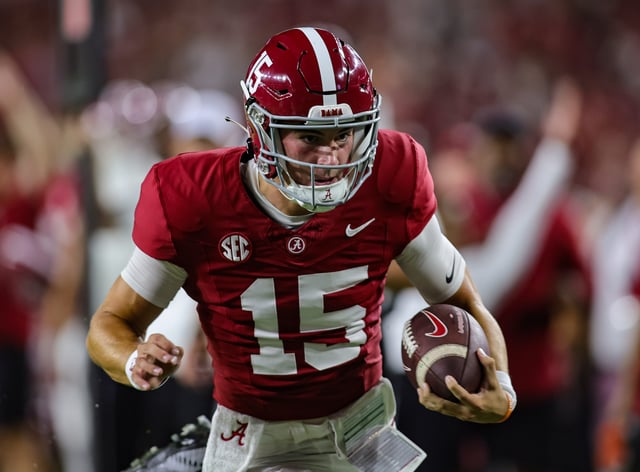 Ty Simpson #15 of the Alabama Crimson Tide runs the ball during the second half against the Western Kentucky Hilltoppers at Bryant-Denny Stadium on August 31, 2024 in Tuscaloosa, Alabama.