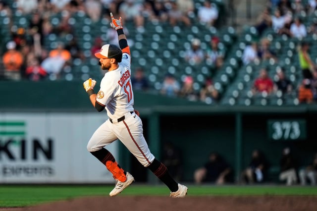 Baltimore Orioles' Colton Cowser rounds the bases after hitting a home run during the second inning of a baseball game against the Boston Red Sox, Monday, Aug. 25, 2025, in Baltimore. (AP Photo/Stephanie Scarbrough)