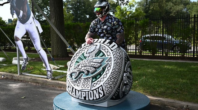 Jul 23, 2025; Philadelphia, PA, USA; A Philadelphia Eagles fan poses during training camp at NovaCare Complex. Mandatory Credit: Kyle Ross-Imagn Images.