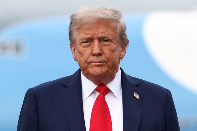 U.S. President Donald Trump looks on at the Joint Base Elmendorf-Richardson in Anchorage, Alaska, U.S., August 15, 2025. REUTERS/Kevin Lamarque/ File Photo