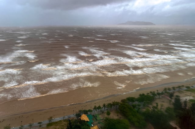 Waves approach Cua Lo beach, as seen through a window, while Typhoon Kajiki approaches in Nghe An province, Vietnam. REUTERS/Minh Nguyen