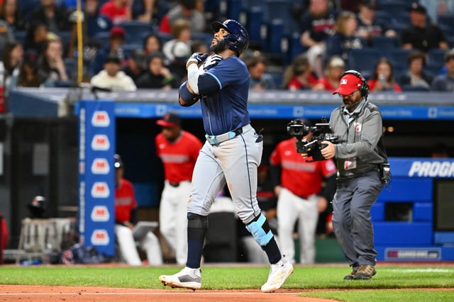 CLEVELAND, OHIO - AUGUST 25: Yandy Díaz #2 of the Tampa Bay Rays celebrates after hitting a solo homerun during the seventh inning against the Cleveland Guardians at Progressive Field on August 25, 2025 in Cleveland, Ohio. (Photo by Jason Miller/Getty Images)