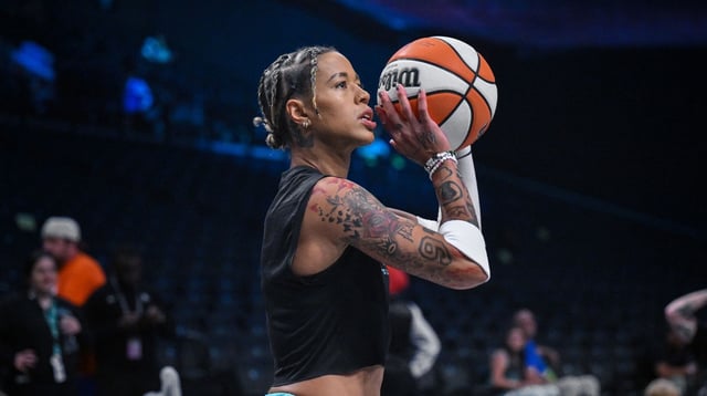 Aug 21, 2025; Brooklyn, New York, USA; New York Liberty guard Natasha Cloud (9) warms up before a game against the Chicago Sky at Barclays Center. Mandatory Credit: John Jones-Imagn Images