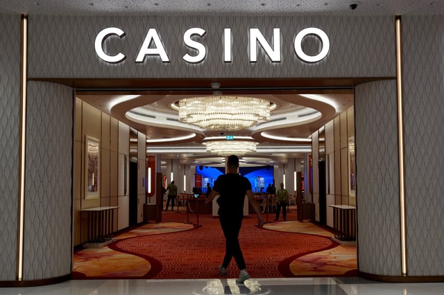 A man enters a casino at City of Dreams, an integrated resort that includes Sri Lanka's first high end casino, in Colombo, Sri Lanka, August 25, 2025. REUTERS/Thilina Kaluthotage