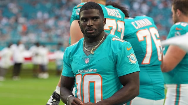 Miami Dolphins star Tyreek Hill faces a costly divorce, ordered to pay $20,000 to $50,000 monthly in support and cover legal fees. (AP Photo/Rebecca Blackwell)