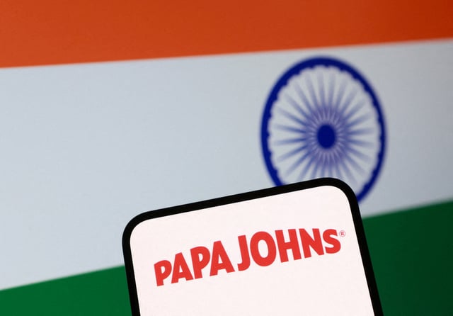 An Indian flag and Papa Johns logo appear in this illustration taken August 25, 2025. REUTERS/Dado Ruvic/Illustration