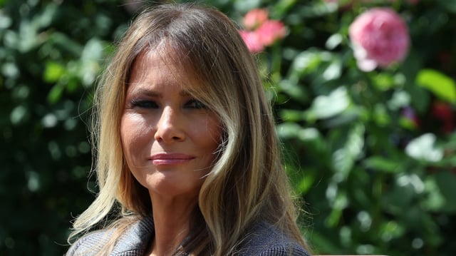 First lady Melania Trump listens as U.S. President Donald Trump speaks during a signing ceremony for the Take it Down Act, in the Rose Garden of the White House in Washington, D.C., U.S., May 19, 2025.