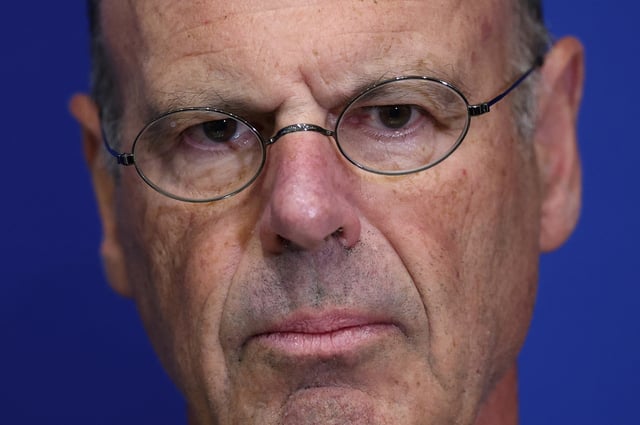 French Minister for Economy, Finance, Industrial and Digital Security Eric Lombard talks to journalists after a meeting with French Senators about French government's budgetary orientations for 2026, at the Bercy Economy and Finance Ministry in Paris, France, July 24, 2025. REUTERS/Gonzalo Fuentes/File Photo