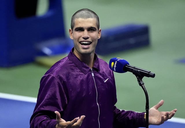 Tennis - U.S. Open - Flushing Meadows, New York, United States - August 26, 2025 Spain's Carlos Alcaraz speaks after winning his first round match against Reilly Opelka of the U.S. REUTERS/Eduardo Munoz