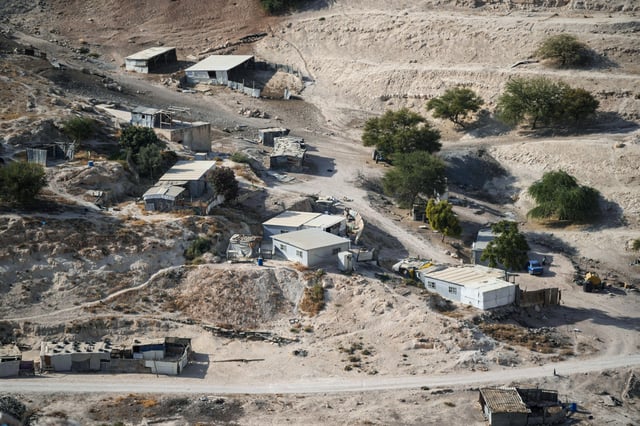 Palestinian hamlets are seen at the E1 area, an open tract of land east of Jerusalem, between the Israeli settlement of Ma'ale Adumim and the occupied West Bank town of Eizariya, on Aug. 14, 2025.