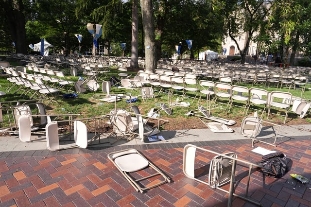 Toppled chairs are scattered on a lawn at Villanova University, where an active shooter was reported on August 21.
