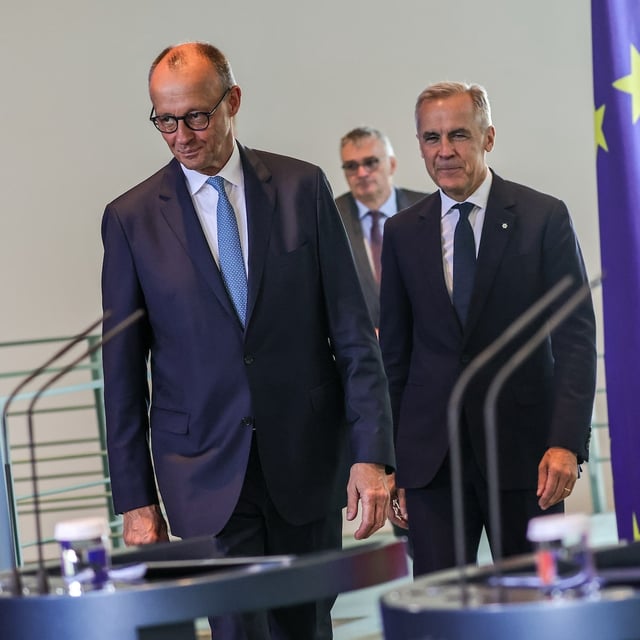 BERLIN, GERMANY - AUGUST 26: German Chancellor Friedrich Merz (L) and Canadian Prime Minister Mark Carney arrive for a joint press conference following talks at the Chancellery on August 26, 2025 in Berlin, Germany. Carney is visiting Germany, Poland and Latvia this week to reportedly speak with leaders on issues including trade, defence and energy. (Photo by Omer Messinger/Getty Images)