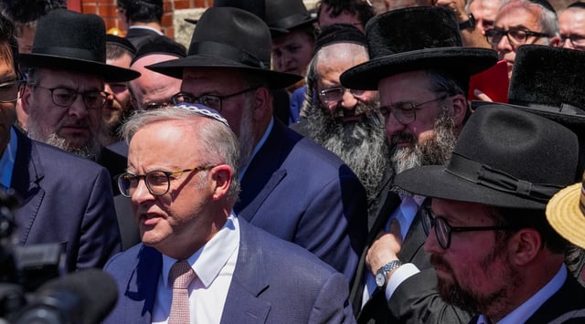 Australian Prime Minister Anthony Albanese speaks to the media after he visited the damaged Adass Israel Synagogue in Melbourne, Australia, Dec. 10, 2024. An arson attack on the Adass Israel Synagogue in Melbourne forced congregants to flee as flames engulfed the building. Albanese condemned the incident as an antisemitic act, emphasizing that such violence at a place of worship is unacceptable in Australia and labelling the event an act of terrorism. (Asanka Ratnayake/Getty Images)