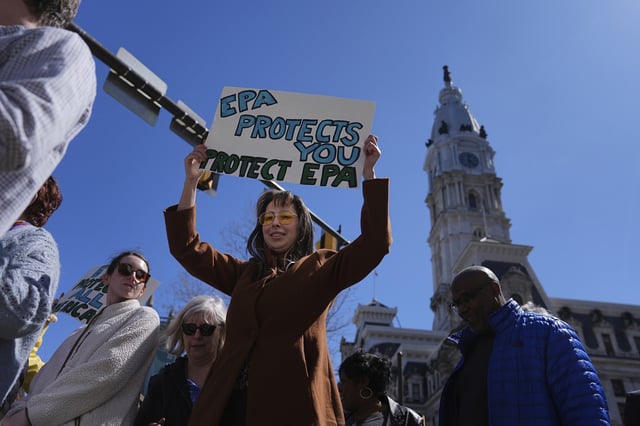 FILE - Environmental Protection Agency employees and their supporters take part in a national march against actions taken by the Trump administration March 25, 2025, in Philadelphia. (AP Photo/Matt Rourke, File)