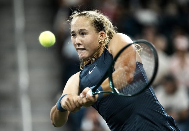 Tennis - U.S. Open - Flushing Meadows, New York, United States - August 25, 2025 Russia's Mirra Andreeva in action during her first round match against Alycia Parks of the U.S. REUTERS/Eduardo Munoz