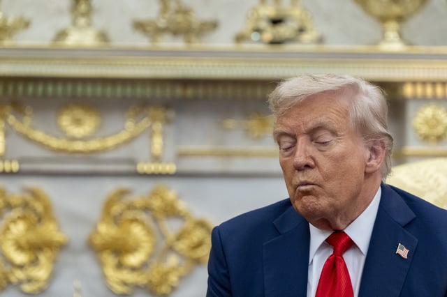 President Donald Trump listens as he meets with South Korean President Lee Jae Myung in the Oval Office of the White House, Monday, Aug. 25, 2025, in Washington. (AP Photo/Alex Brandon)