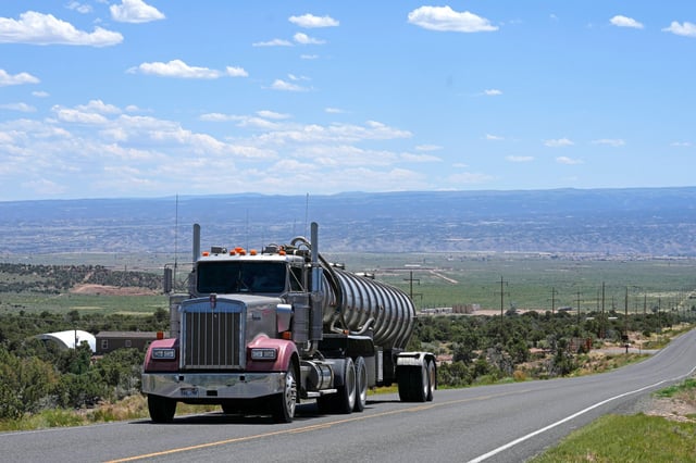 A tanker truck transports crude oil on a highway near Duchesne, Utah, on July 13, 2023.