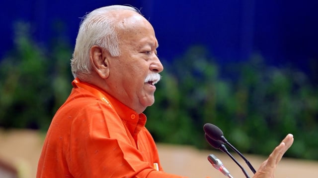 RSS chief Mohan Bhagwat addresses the gathering during an event to mark 100 years of the Rashtriya Swayamsevak Sangh in New Delhi.