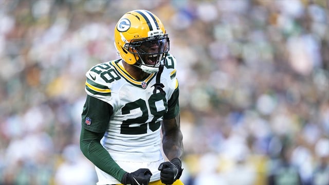 Aug 23, 2025; Green Bay, Wisconsin, USA; Green Bay Packers linebacker Isaiah Simmons (28) reacts to tackling Seattle Seahawks running back Jacardia Wright (31) during the second half at Lambeau Field. Mandatory Credit: Kayla Wolf-Imagn Images