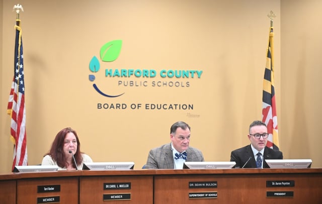 From left, Board member Dr. Carol Mueller, Superintendent of Schools, Dr. Sean Bulson and board president Dr. Aaron Poynton during the Board of Education of Harford County meeting in Bel Air on Monday. (Brian Krista/Staff)