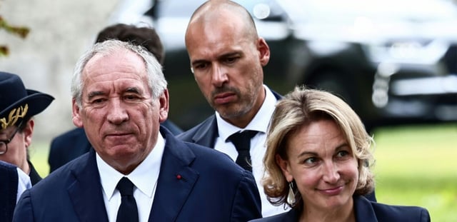 Le Premier ministre François Bayrou et la secrétaire générale de la CFDT Marylise Léon à l'université d'été de la CFDT à Boissy-la-Rivière, en Essonne, le 26 août 2025
