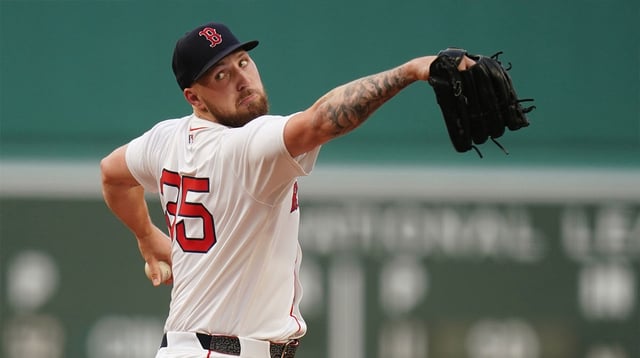 Aug 5, 2025; Boston, Massachusetts, USA; Boston Red Sox pitcher Garrett Crochet (35) throws a pitch against the Kansas City Royals in the first inning at Fenway Park. Mandatory Credit: David Butler II-Imagn Images